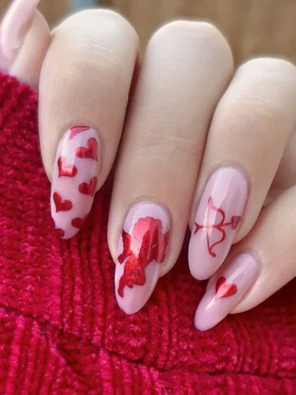 3 de 4: Diseño de cupido Mejores Diseños de Uñas para San Valentín