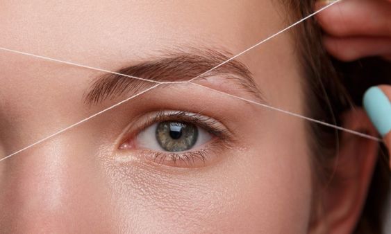 depilación con hilo - Cómo tener las cejas perfectas